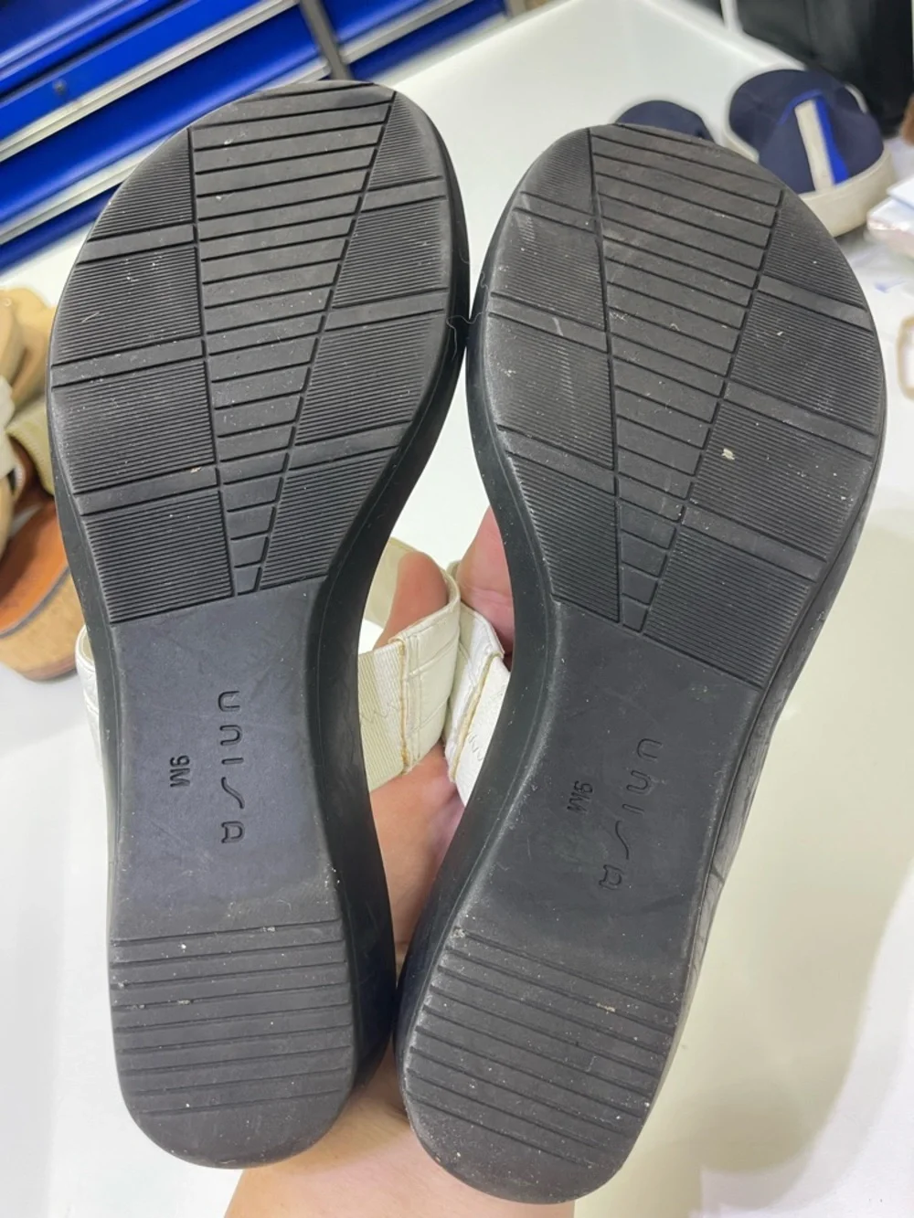 Unisa brand white mules featuring a gold-tone metal detail. - Picture 6 of 6